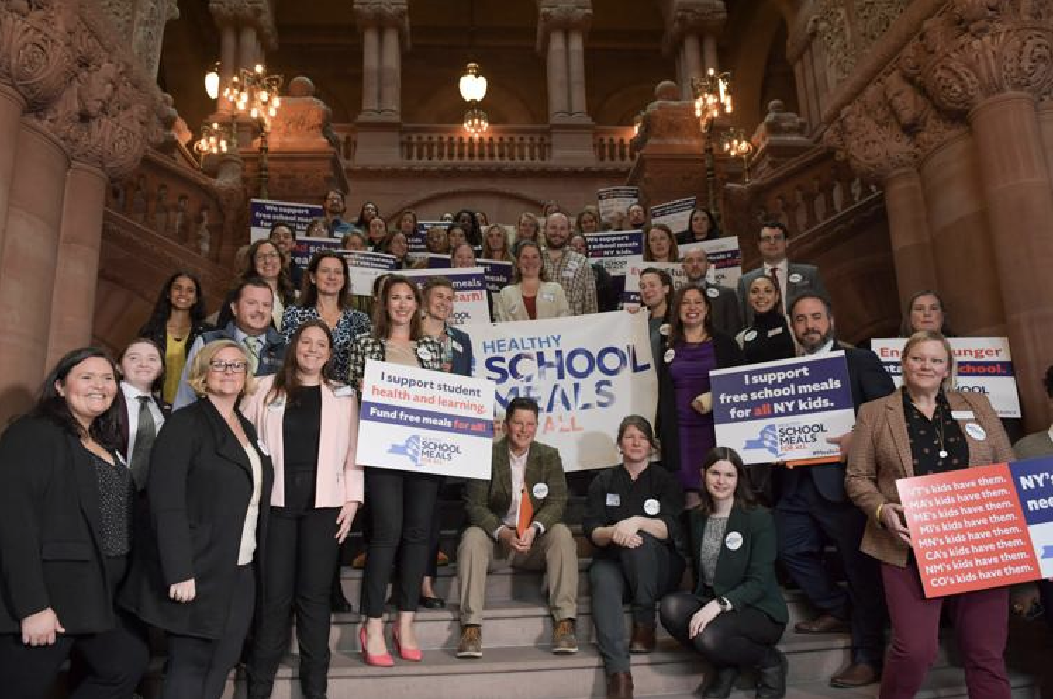 group photo of Healthy School Meals for All Coalition members